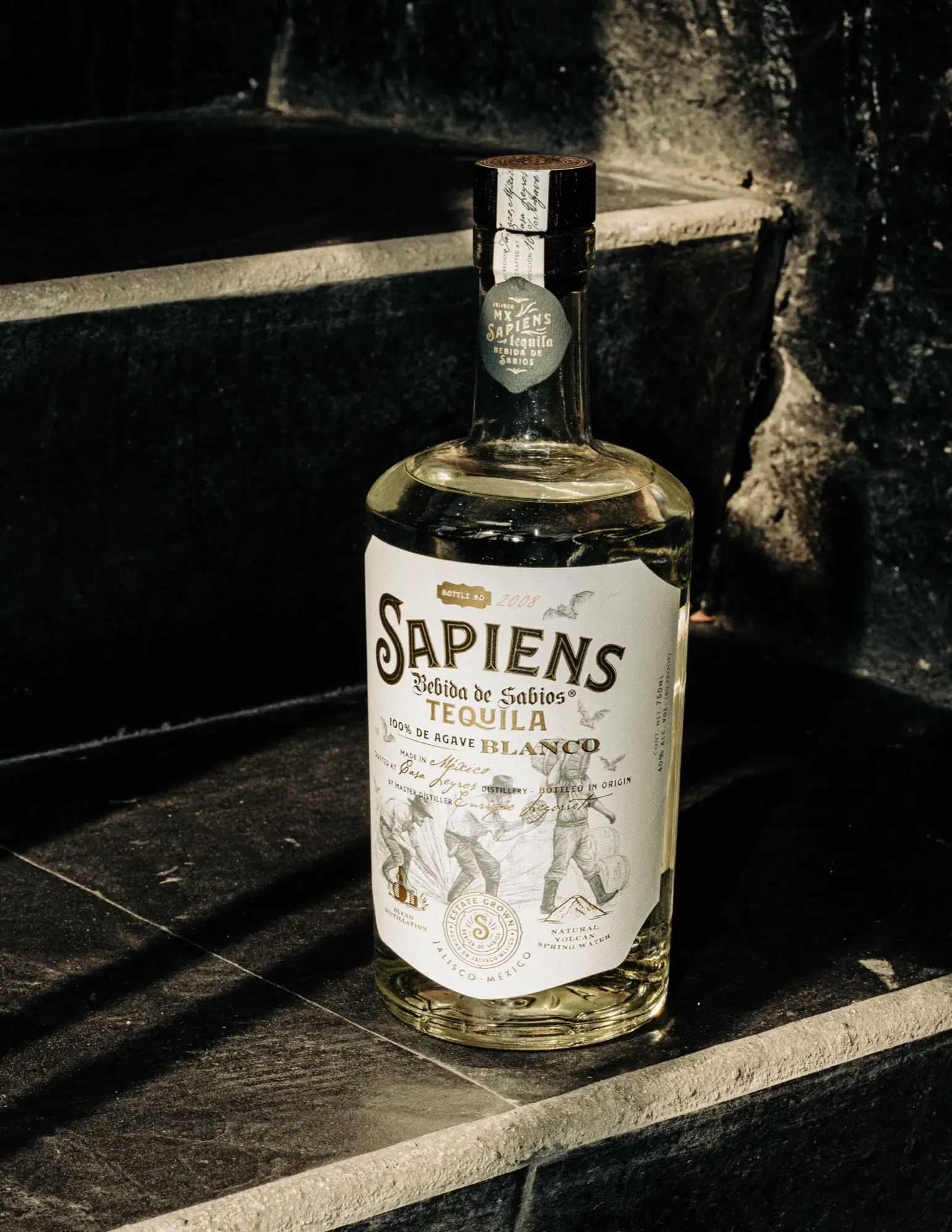 Sapiens Tequila Blanco on volcanic stone steps