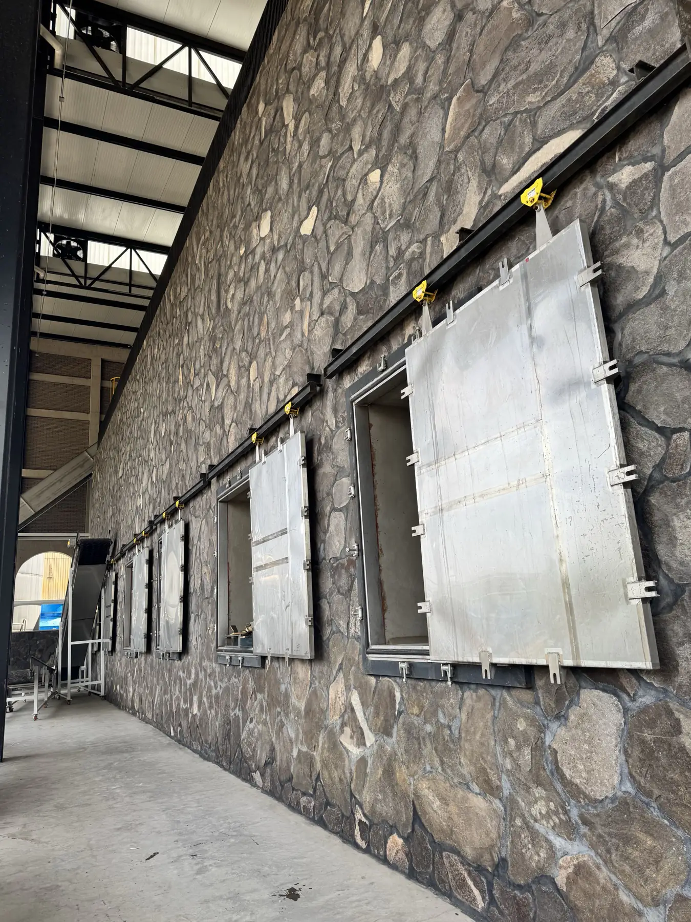 Masonry brick ovens with steel doors at the distillery